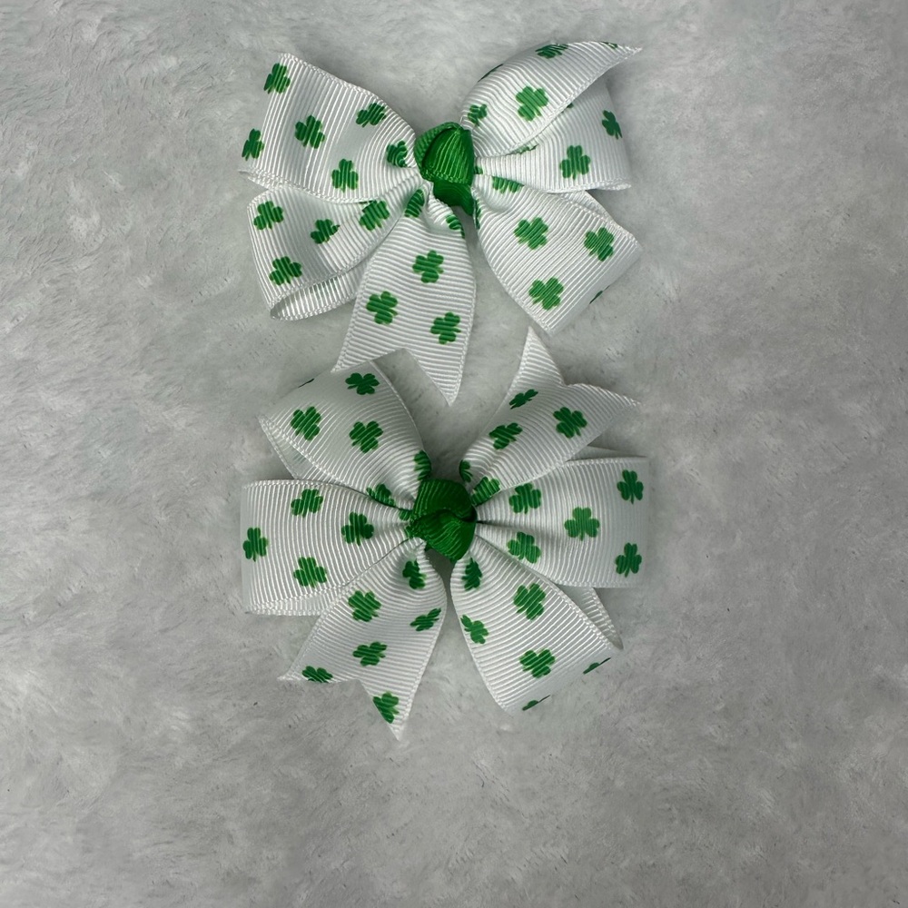 Little girls handmade pigtails hair bows.